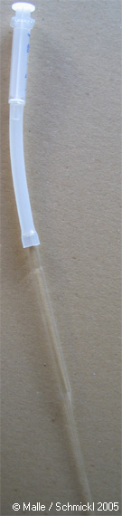 Suction extraction device for heavy oils